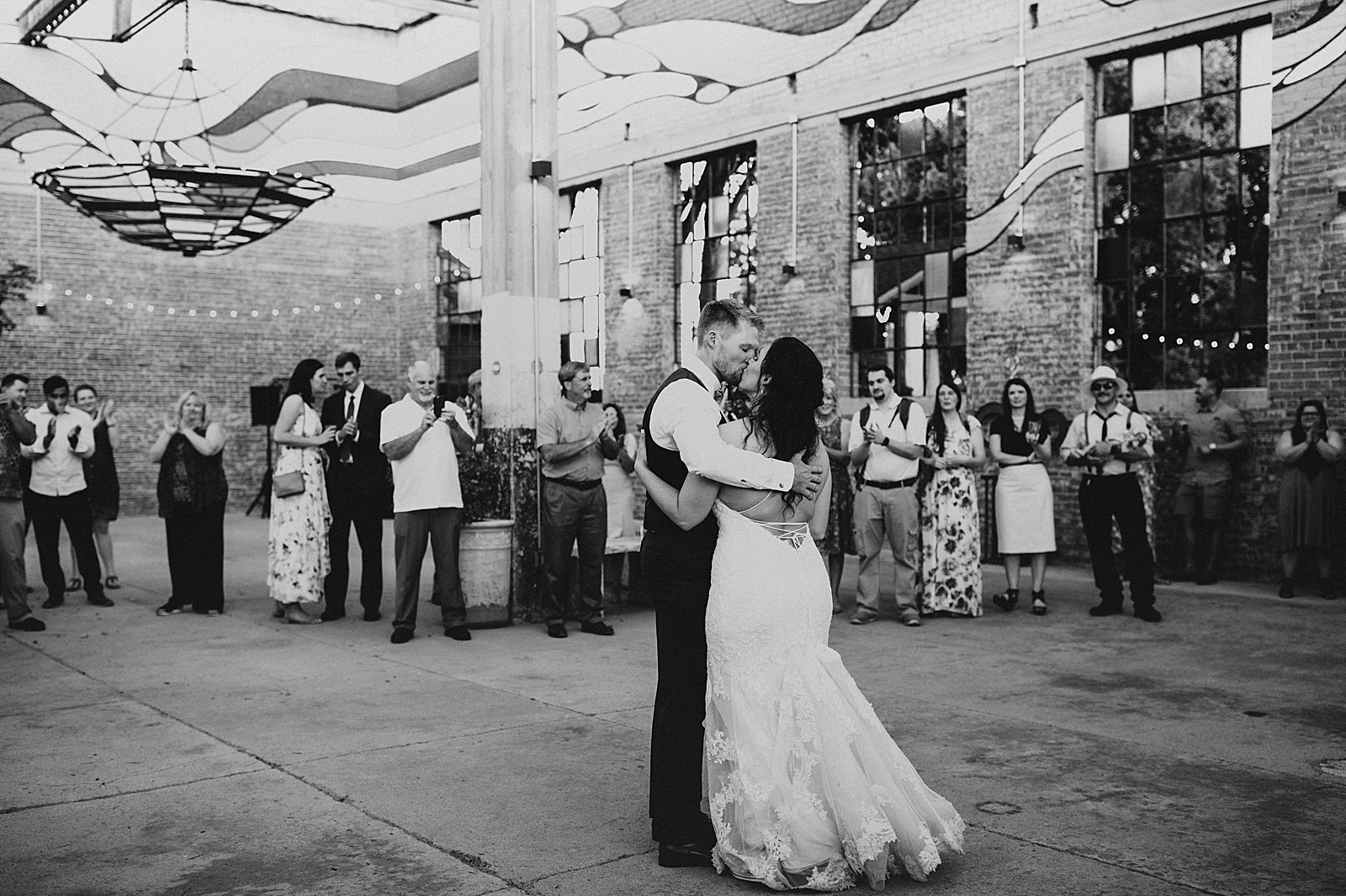 The reception photos at their wedding in the Soda District Courtyard in Abilene.