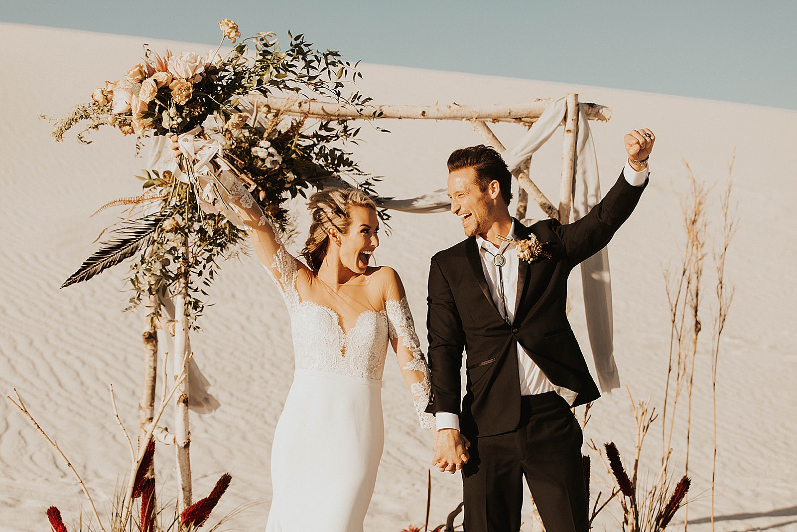 A bride and groom photo at their elopement in the White Sands National Monument in New Mexico. 