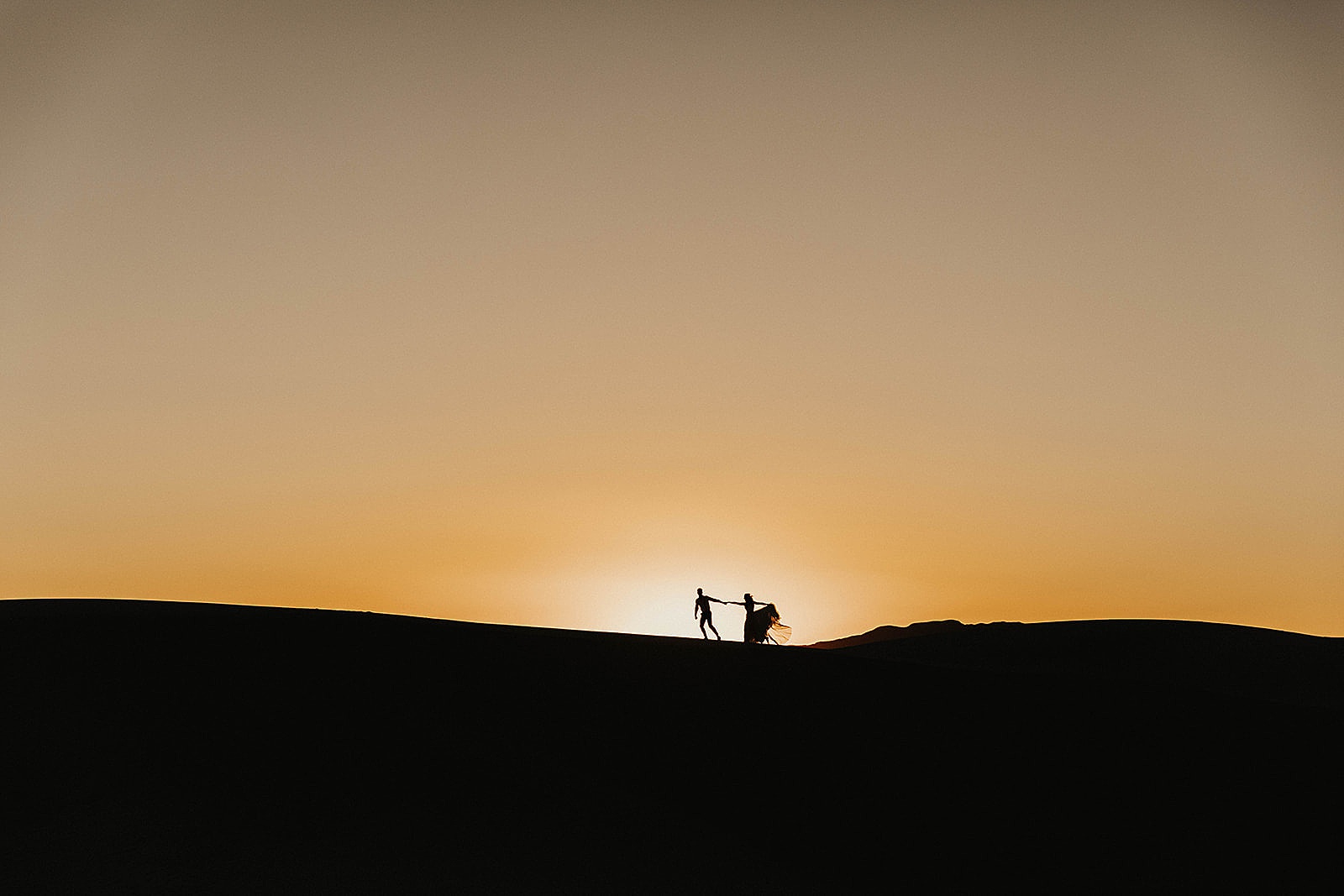A bride and groom photo at their elopement in the White Sands National Monument in New Mexico. 