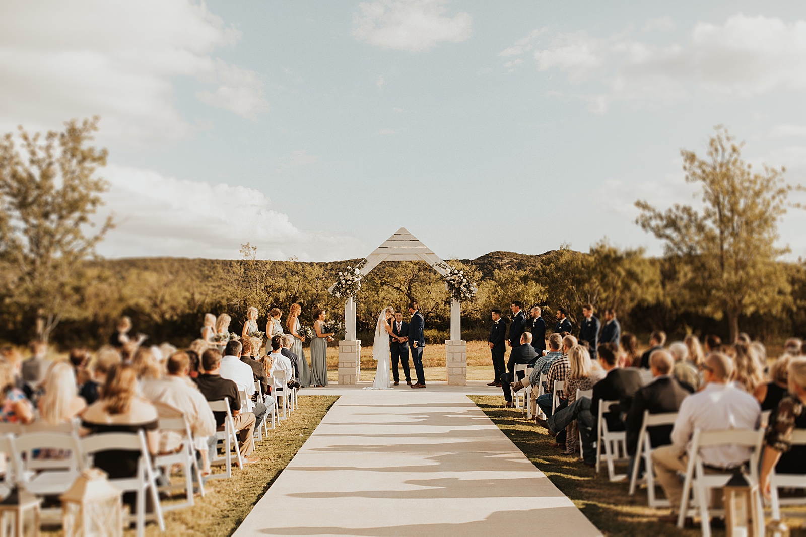 Beautiful ceremony photo at Sabrina Cedars Wedding Venue in Abilene, TX.