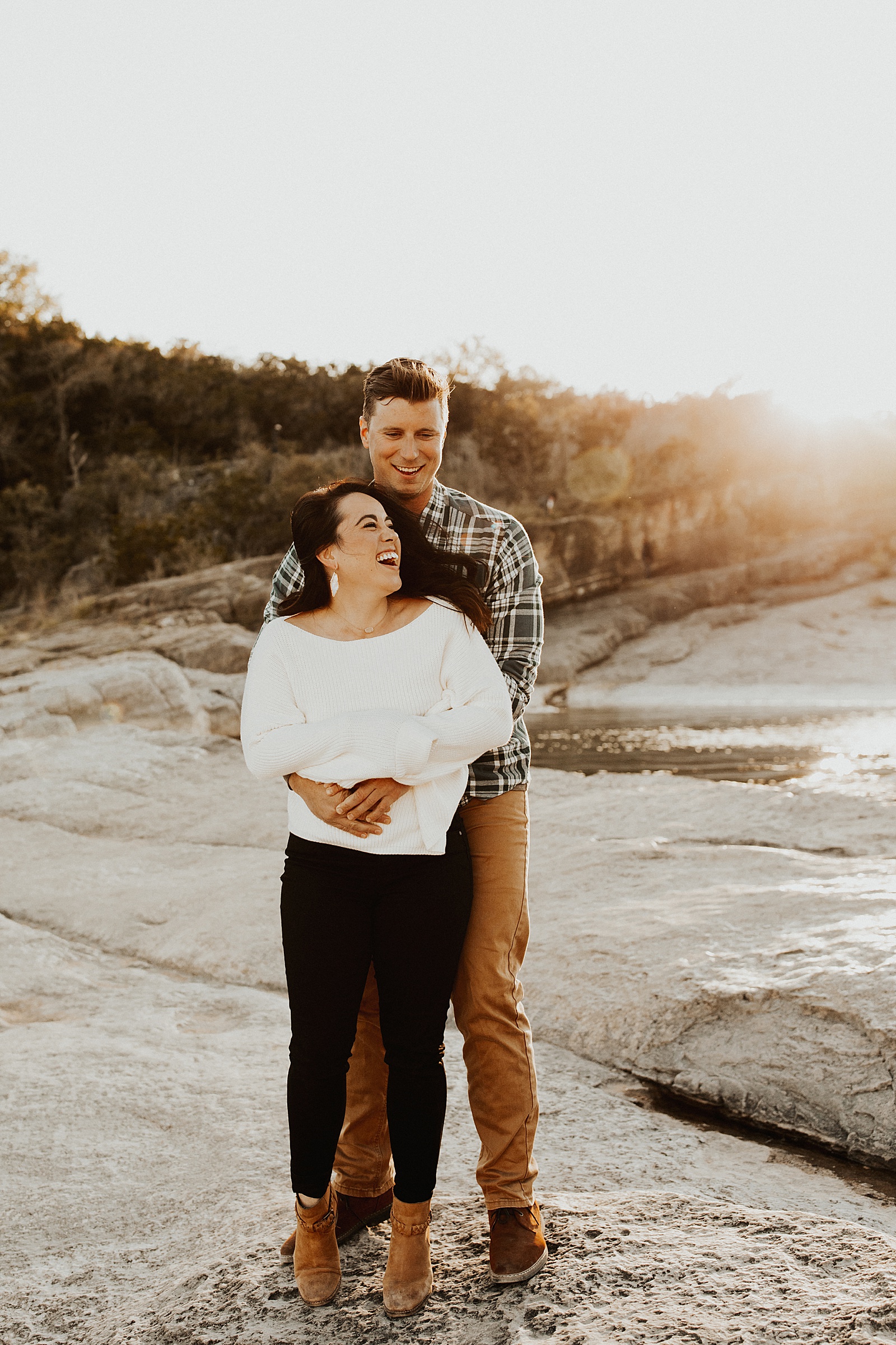 These two enjoyed some pizza and champagne for their Pedernales Falls engagement session in Austin, TX.