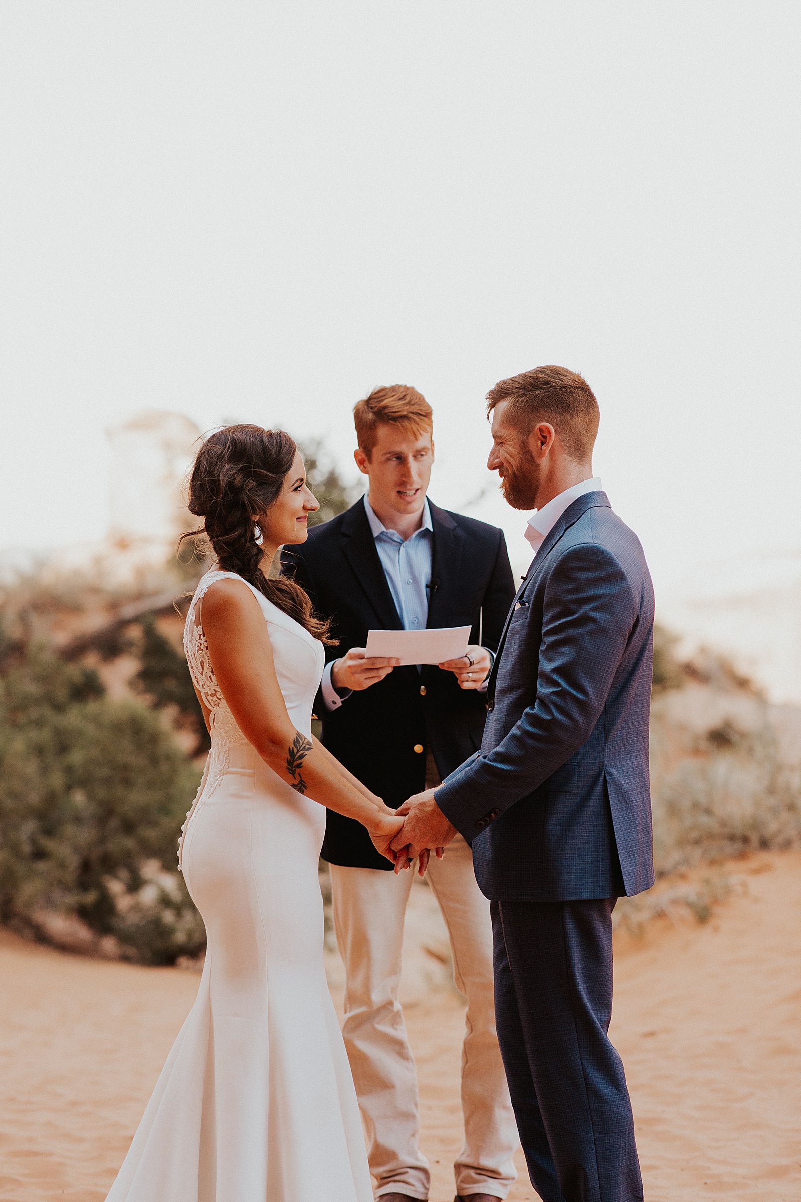 Bride and groom at their Arches National Park wedding ceremony. 