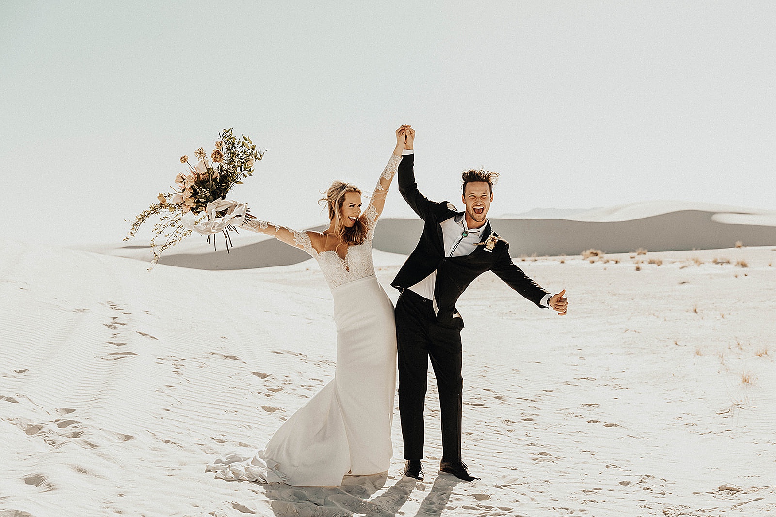 A bride and groom photo at their elopement in the White Sands National Monument in New Mexico.