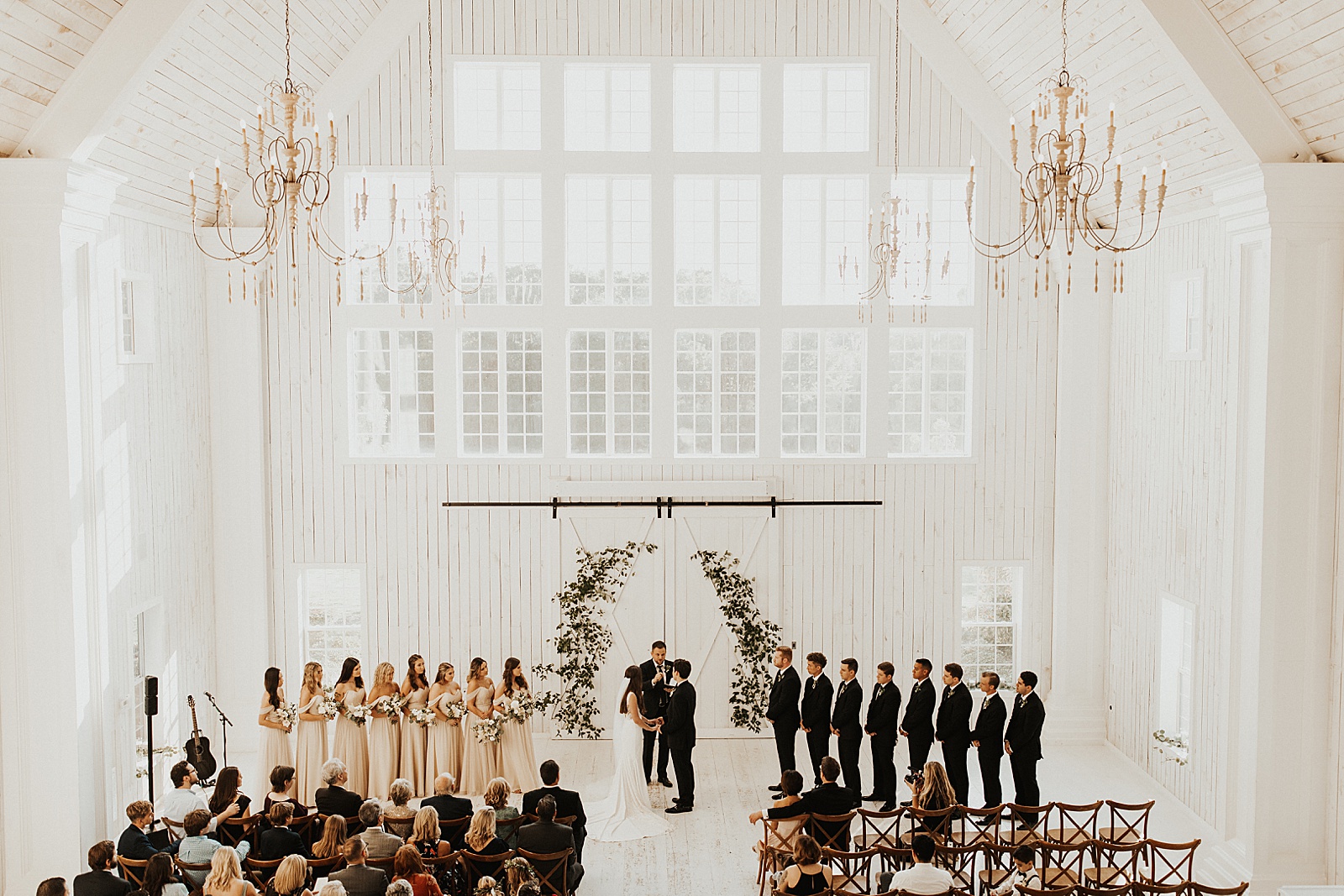 A wedding ceremony photo at the White Sparrow Barn in Dallas, TX. 